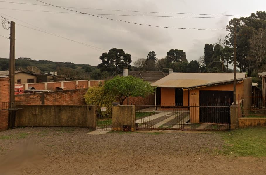 TERRENO COM CASA FRENTE PARA BR285